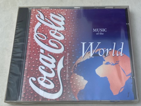 26122-1 € 4,00 coca cola cd misic of the world.jpeg